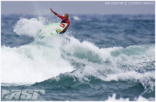 Kelly Slater Catching Air at The Billabong Pro Day 3.  Credit ASP Tostee